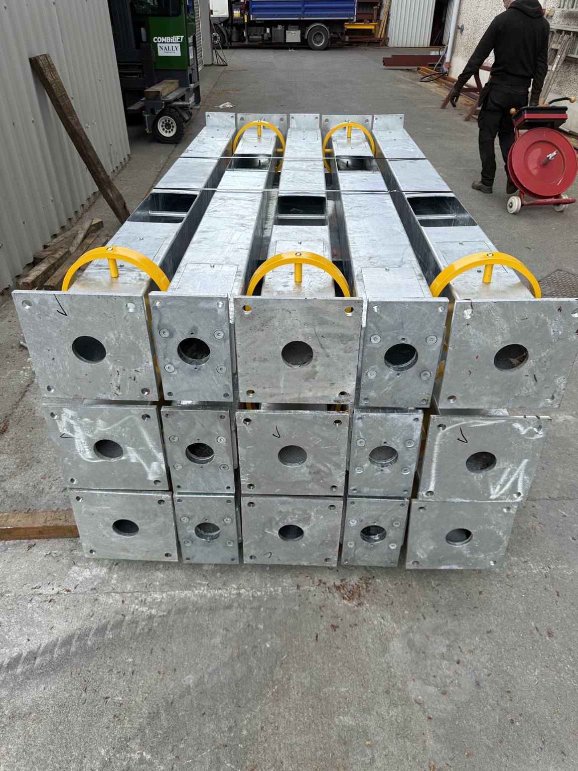 Precision fabricated galvanised public transport support structures prepared for digital train information installations