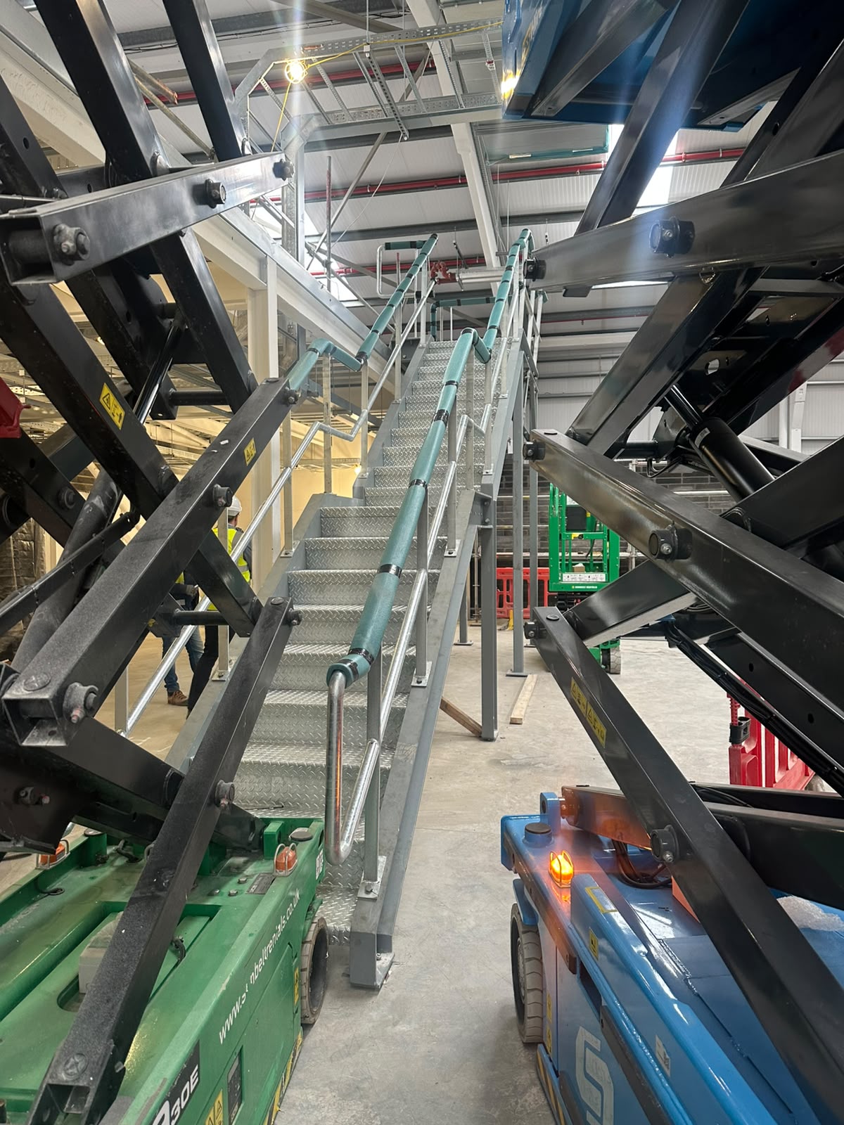 Steel access stairs and handrails to an industrial plant area