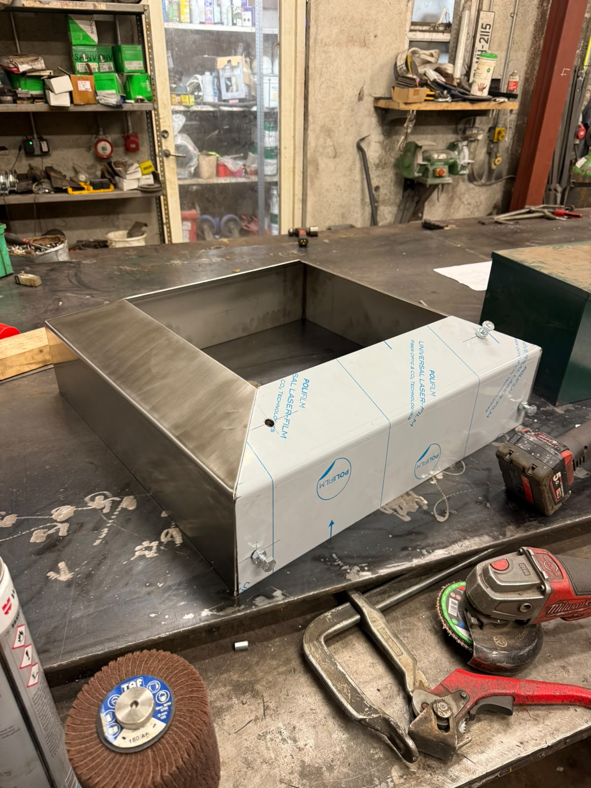 Fabricated stainless steel sheet enclosure on the workshop bench